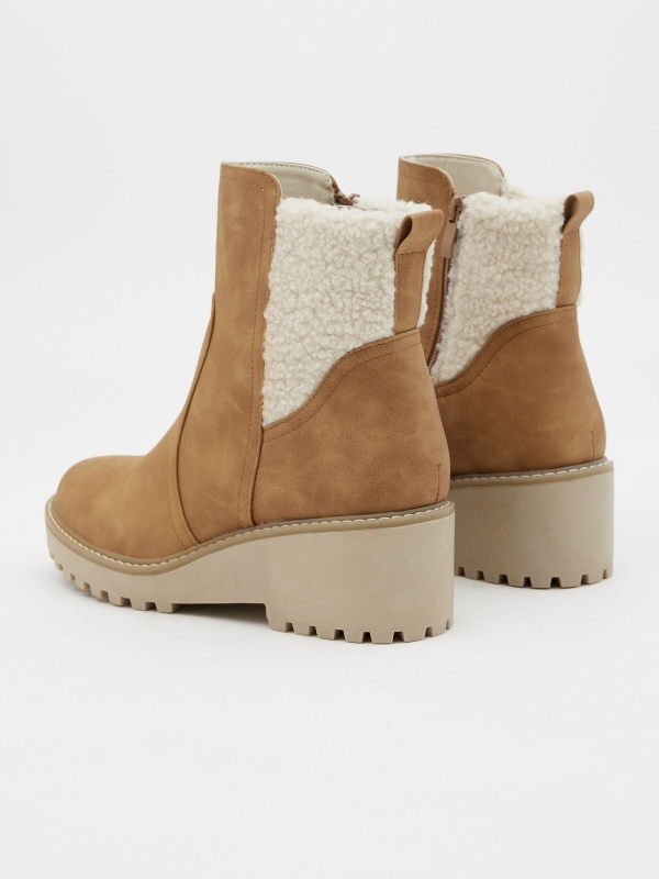 Wedge and sheepskin ankle boots brown 45º back view