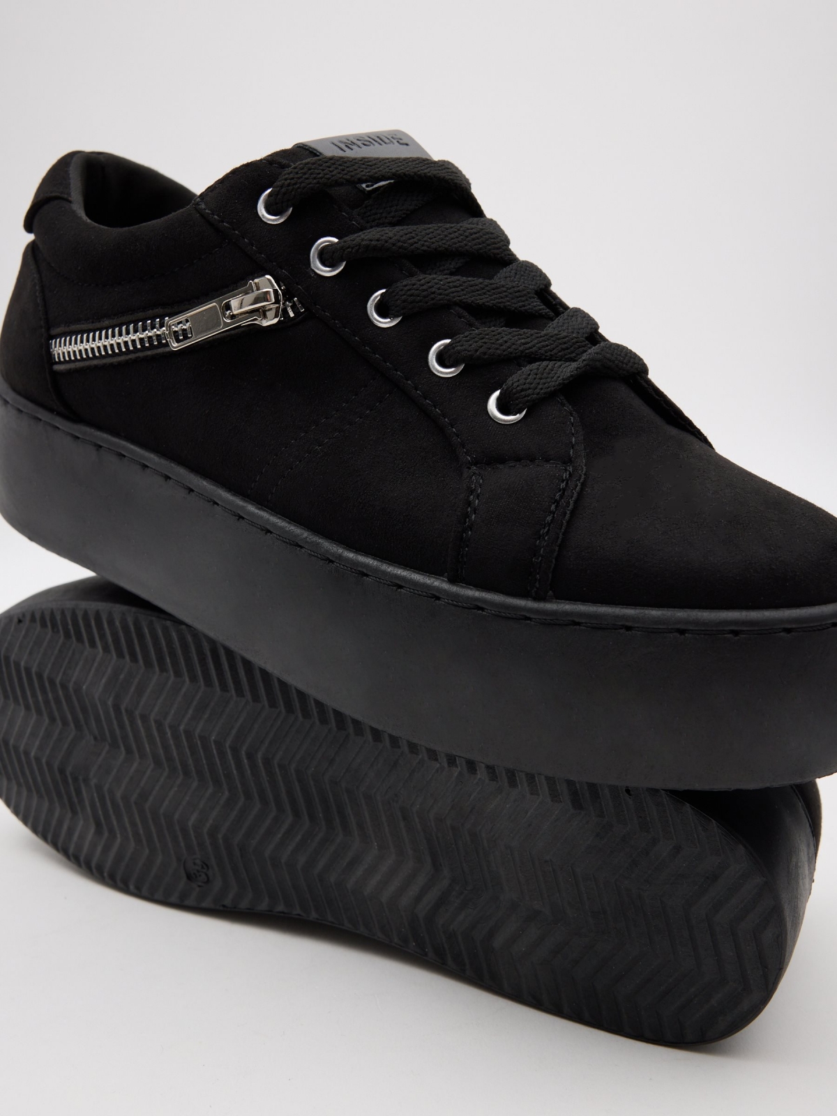 Platform sneakers with zipper black detail view
