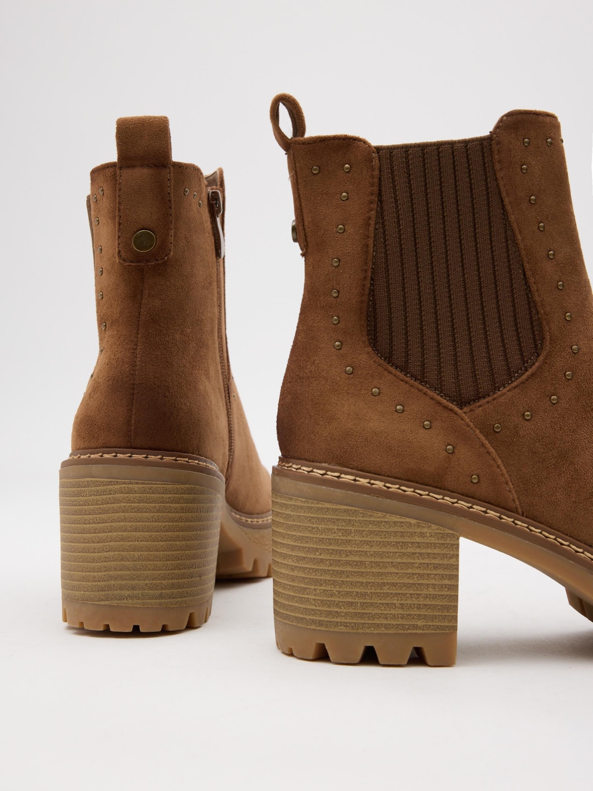 Platform ankle boots with studs brown detail view
