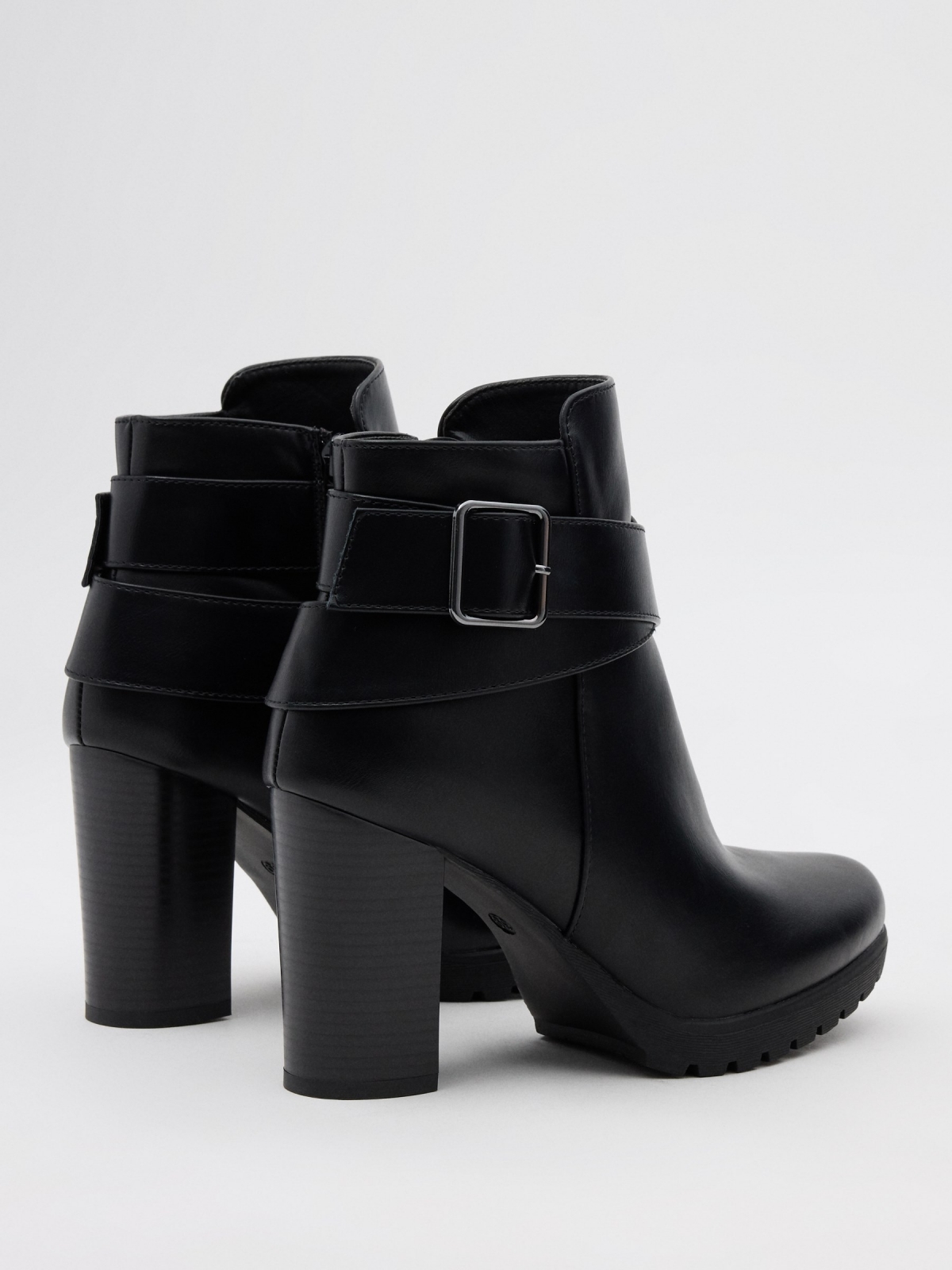 Ankle boots buckle cross straps black 45º back view