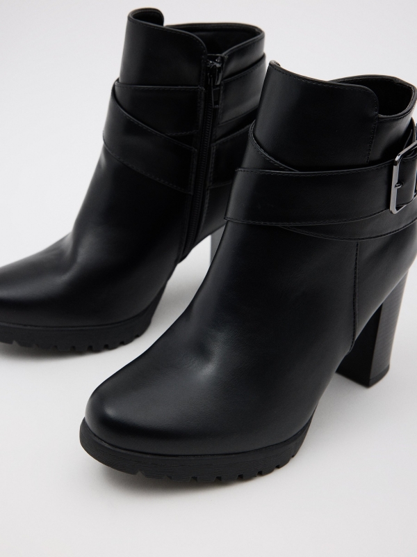Ankle boots buckle cross straps black detail view