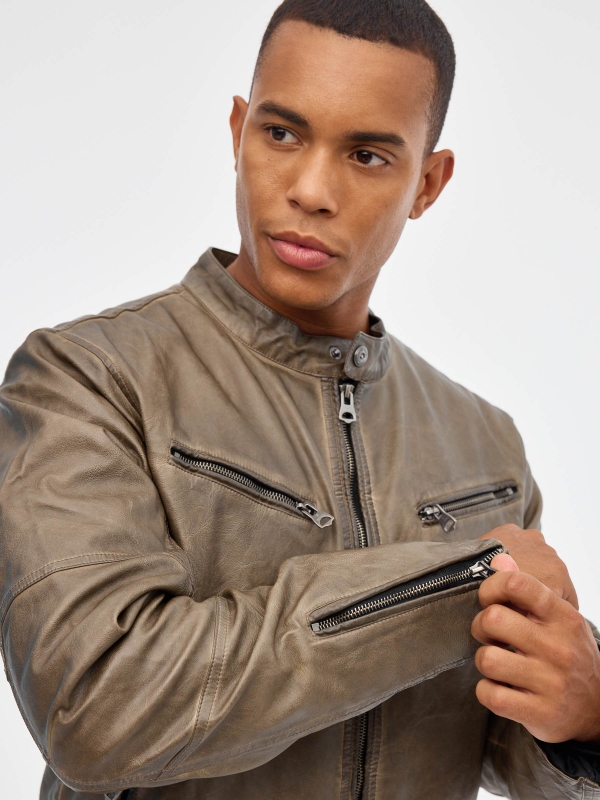 Leather effect jacket with zips brown detail view