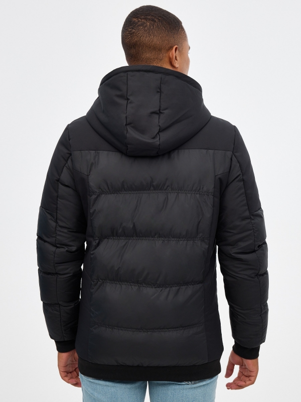 Nylon coat with long zippers black middle back view