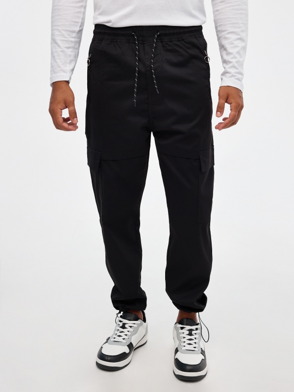Jogger pants with adjustable ankles black middle front view