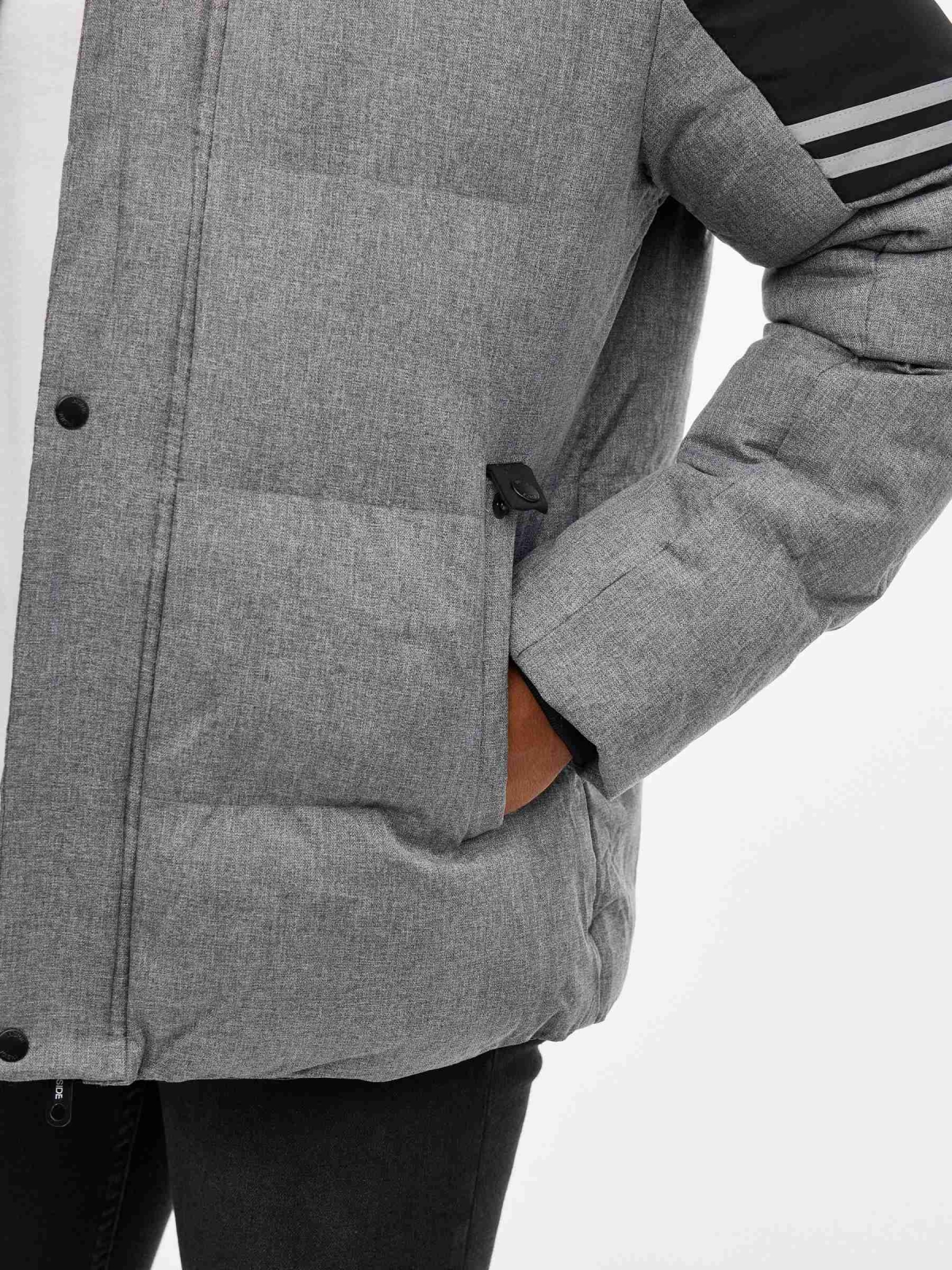 Block color quilted coat grey detail view