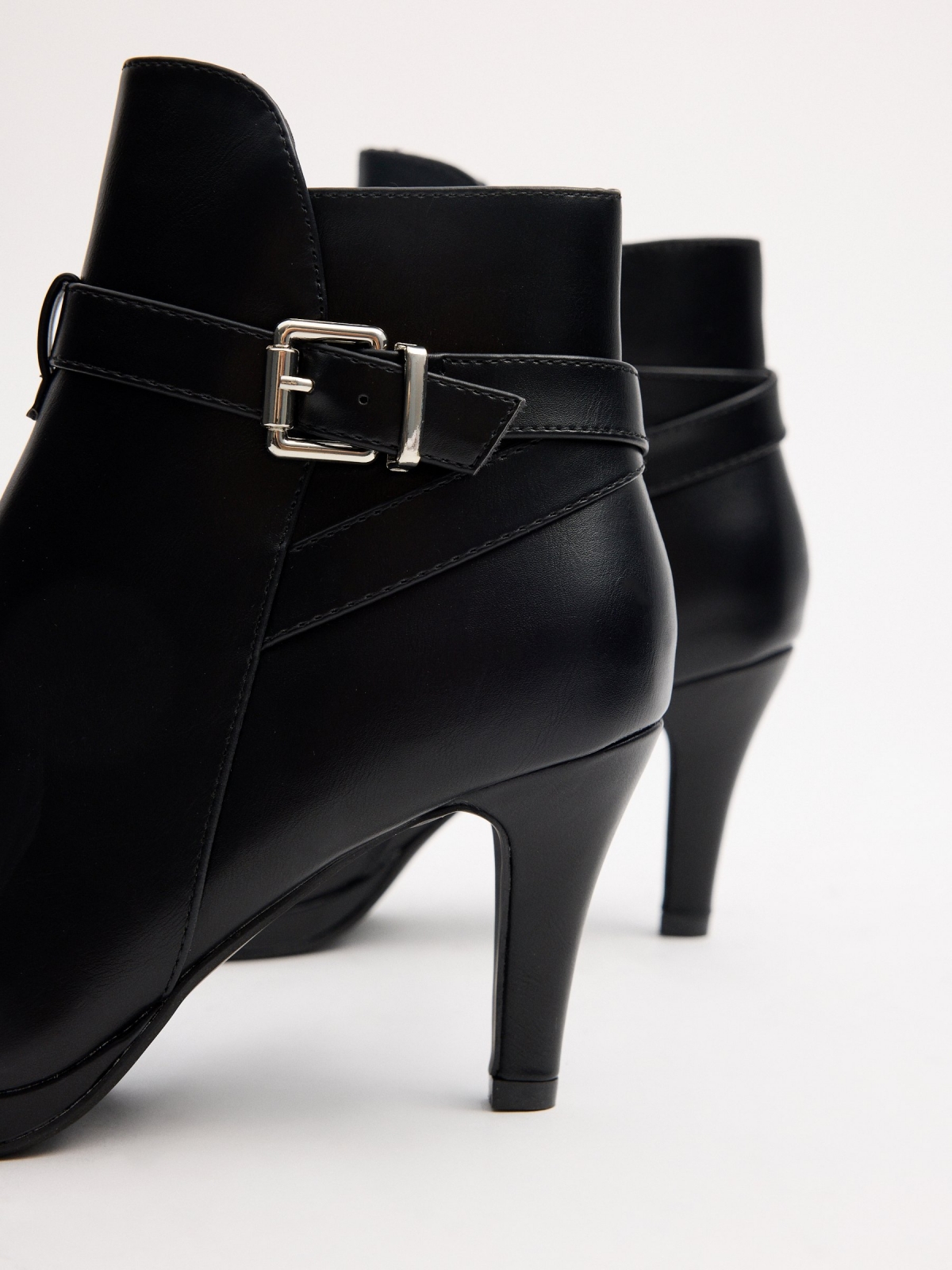 Black ankle boots with buckle heel black detail view