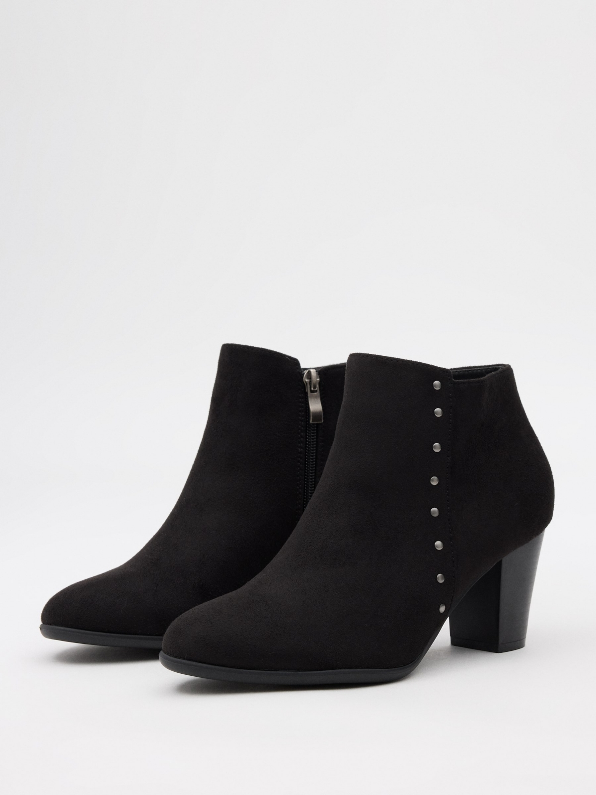 Heeled ankle boots with studs black 45º front view