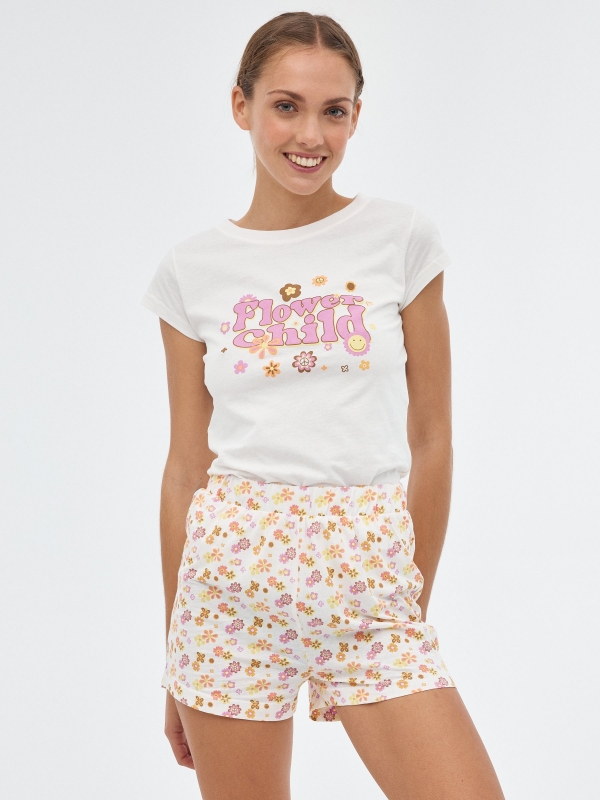 Pijamas para crianças com flores off white vista meia frontal