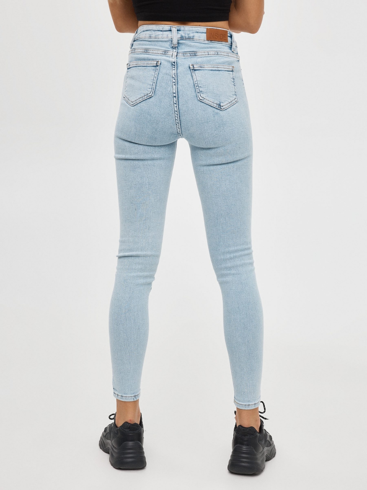 High rise skinny jeans light blue middle back view