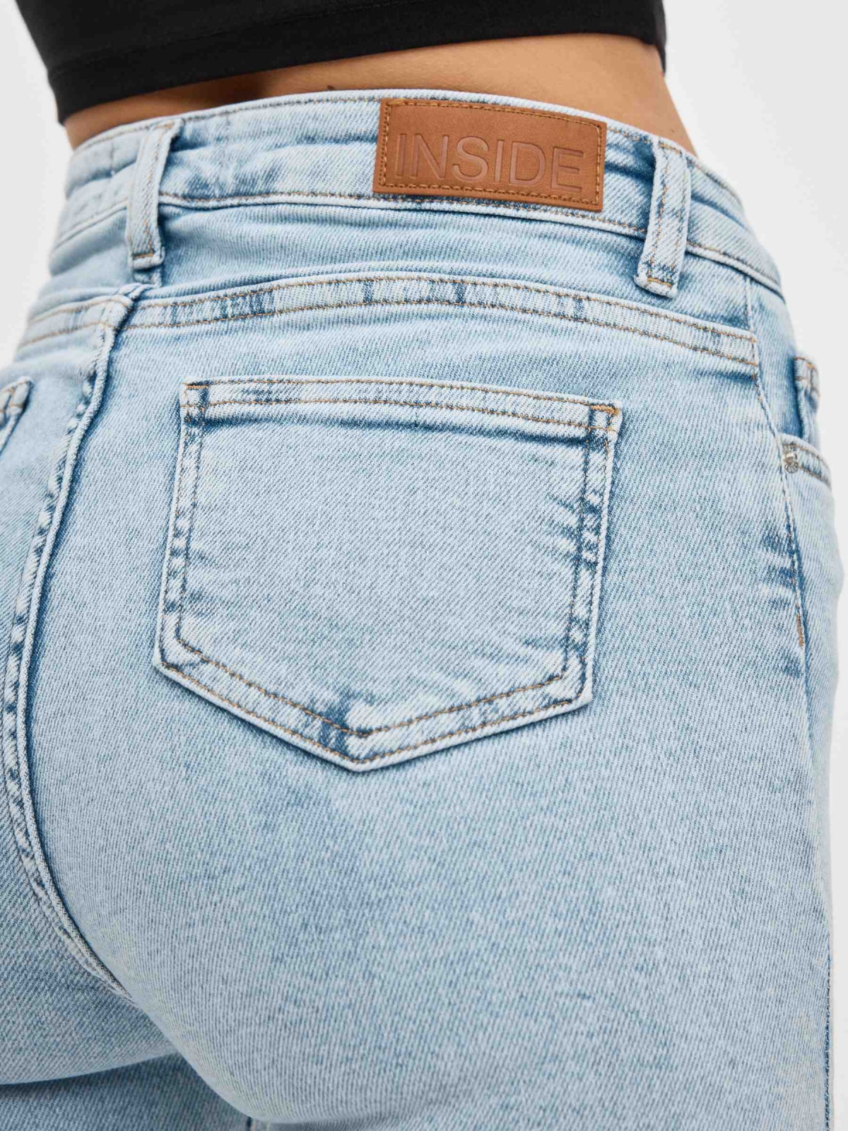 High rise skinny jeans light blue detail view