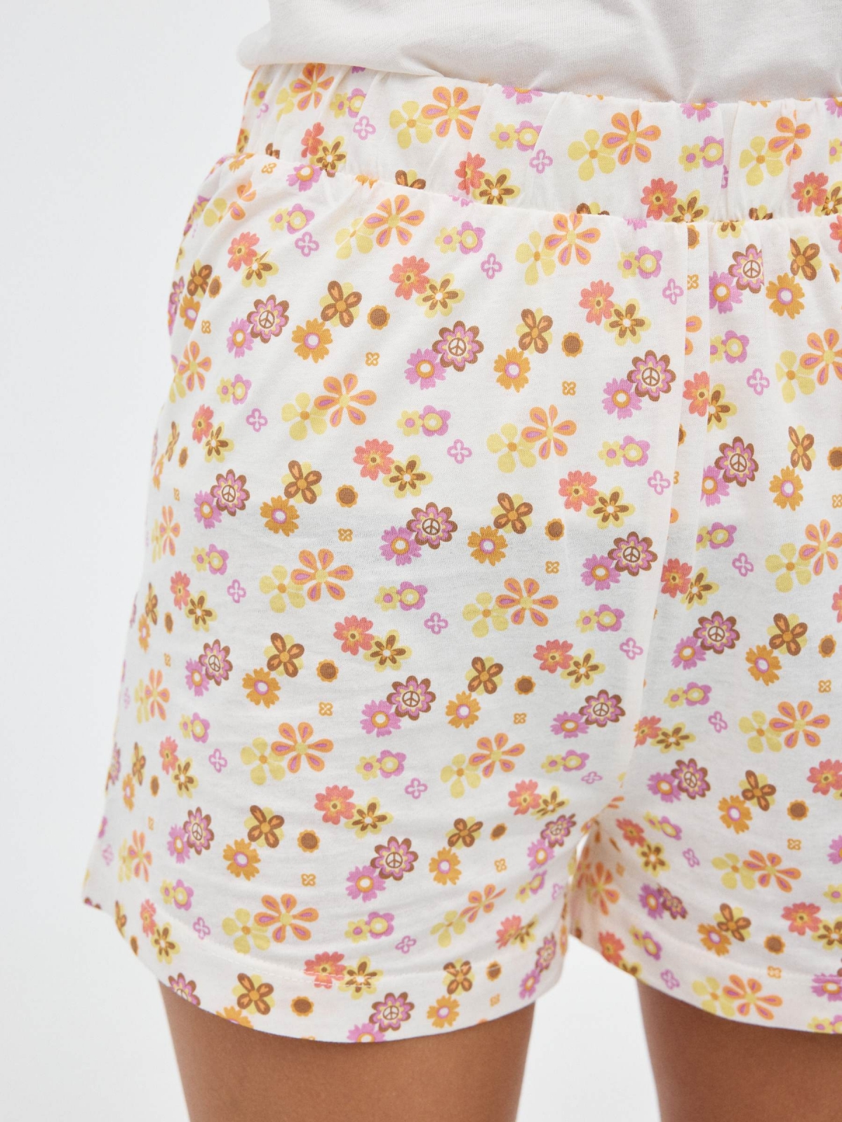 Pijamas para crianças com flores off white vista detalhe