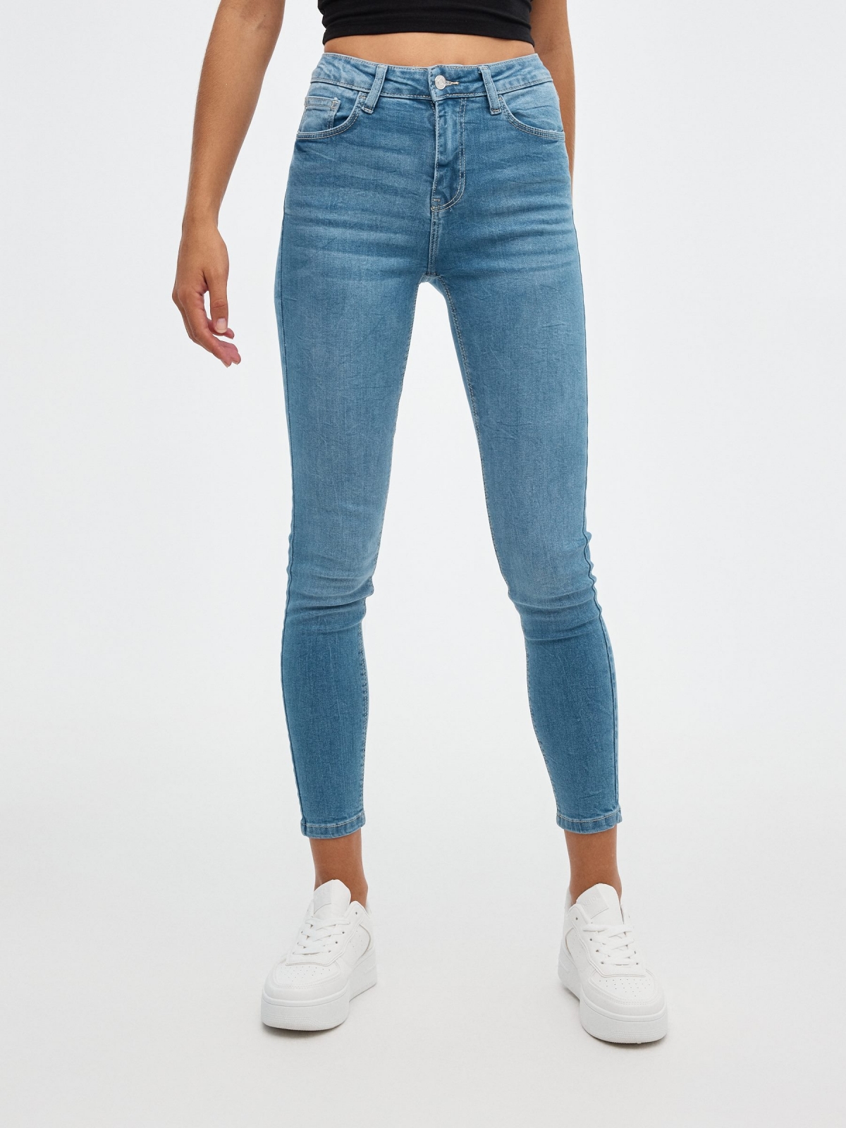 Mid-rise skinny jeans blue middle front view