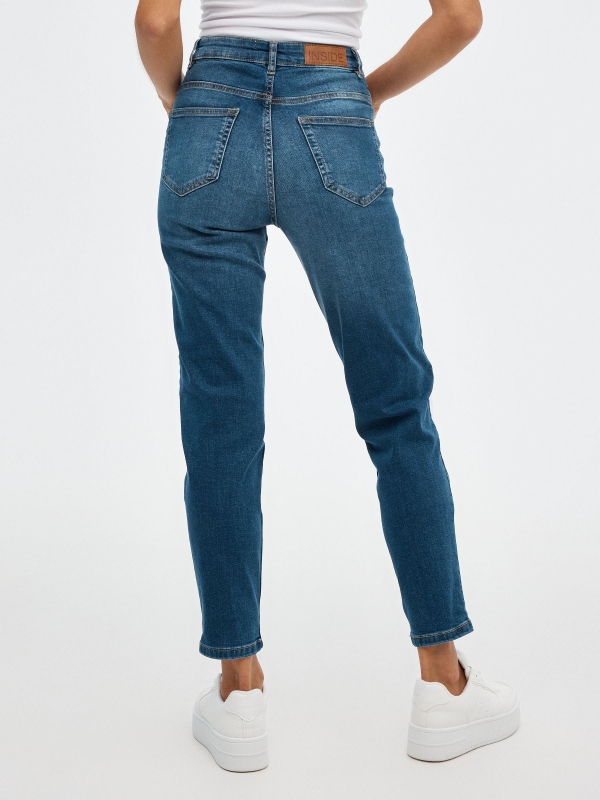 Mid-rise skinny jeans dark blue middle back view