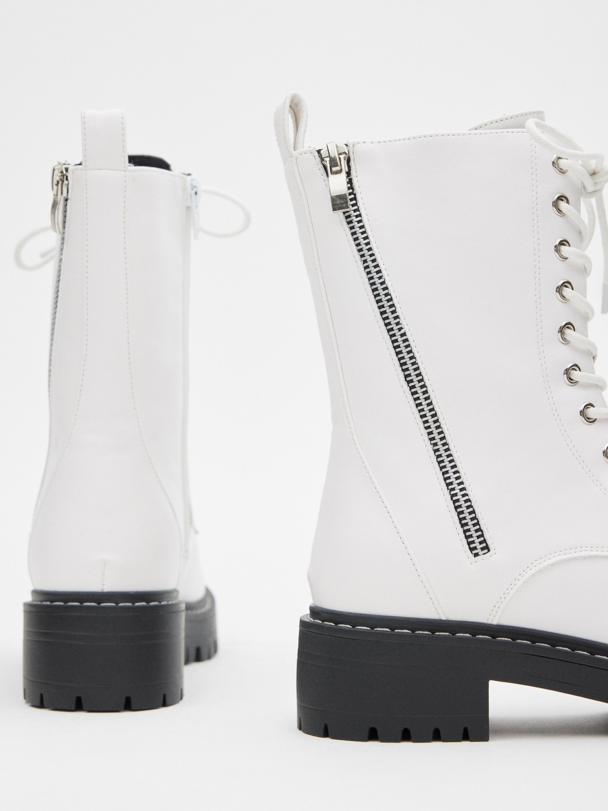 Mid-calf boots with laces detail view