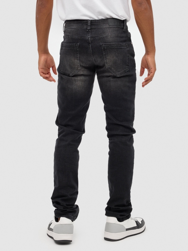Jeans slim denim gris negro vista media trasera