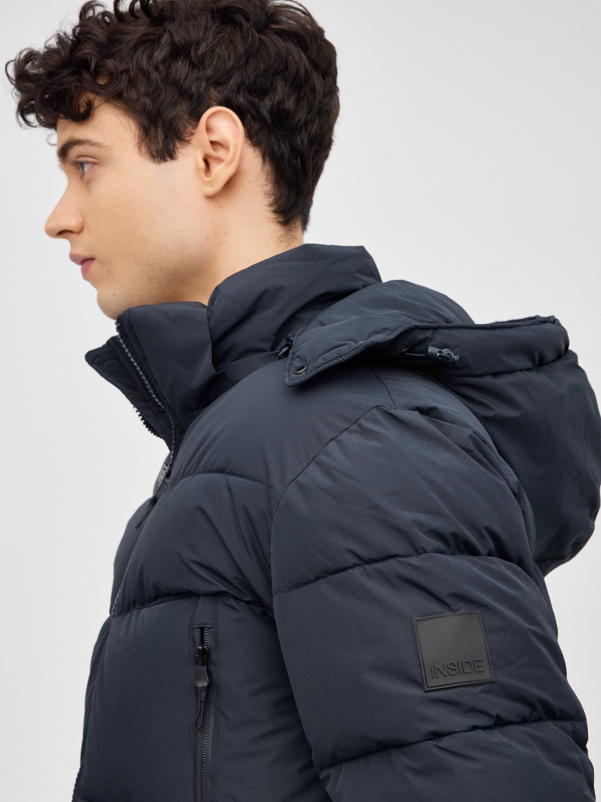Nylon coat with zippered pockets blue detail view