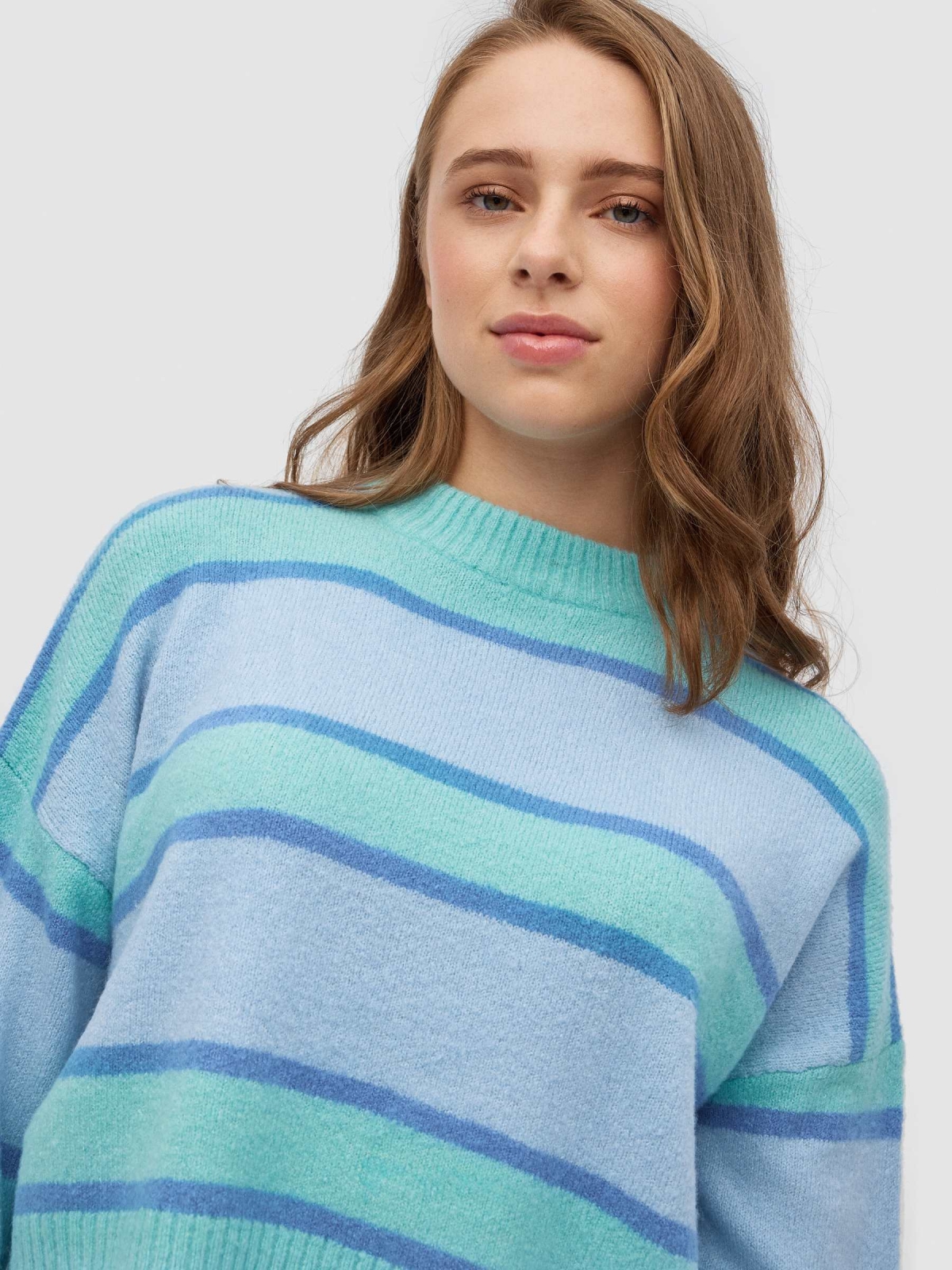 Oversized striped sweater light blue detail view