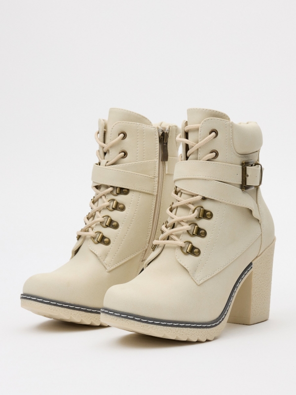 Ankle boots with crossed buckle white 45º back view