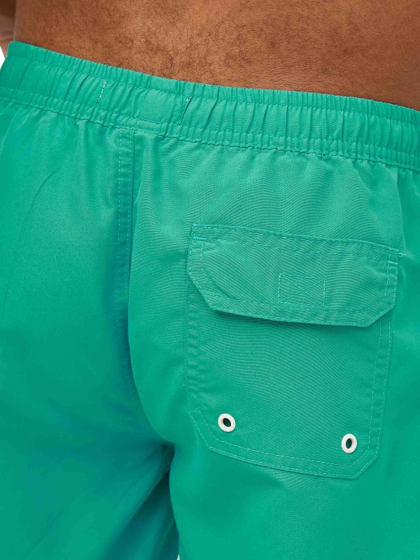 Contrast trim swimsuit green detail view