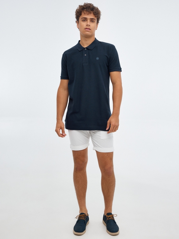 Basic polo shirt with engraved logo navy front view