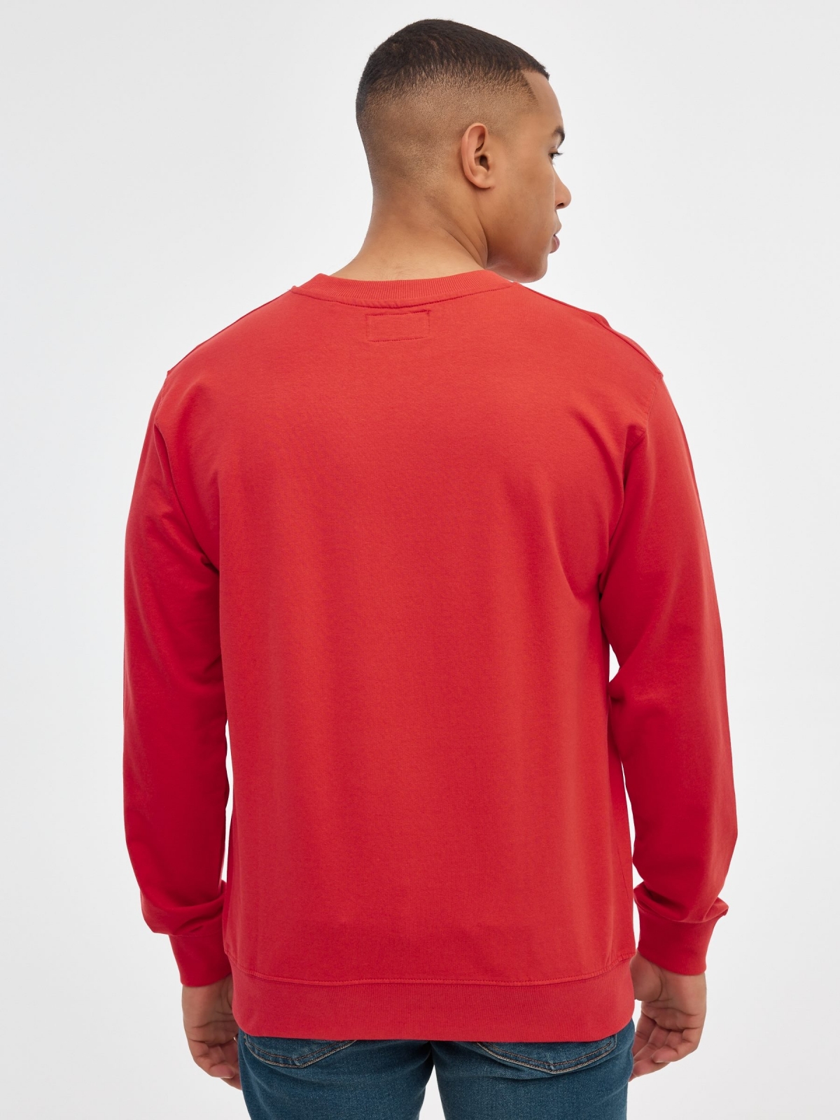 INSIDE hoodless sweatshirt red middle back view