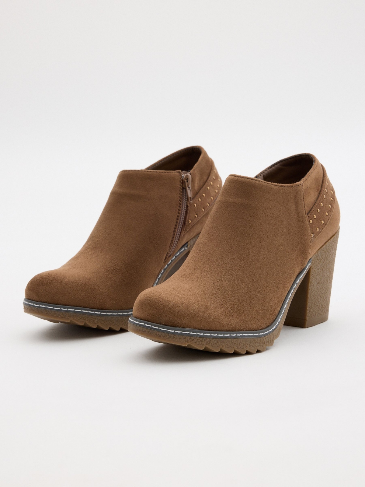 Camel heeled ankle boots with studs brown 45º front view