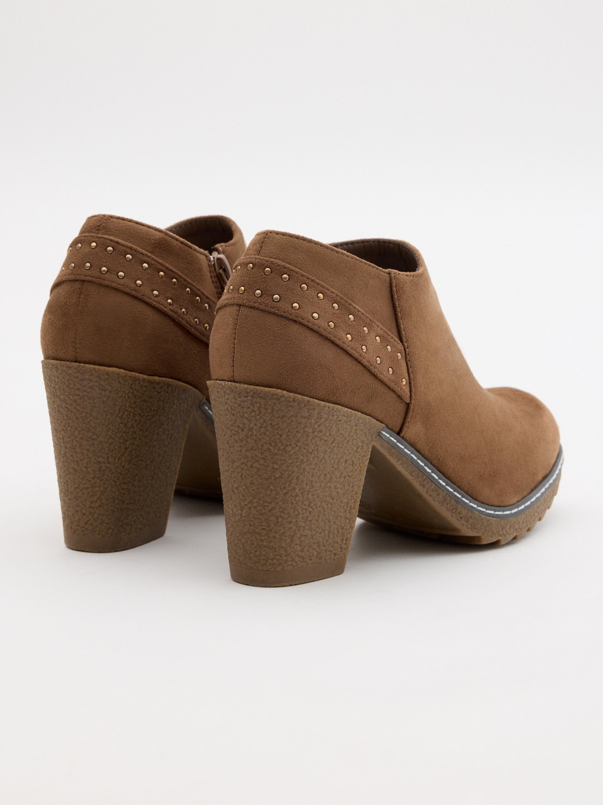 Camel heeled ankle boots with studs brown 45º back view