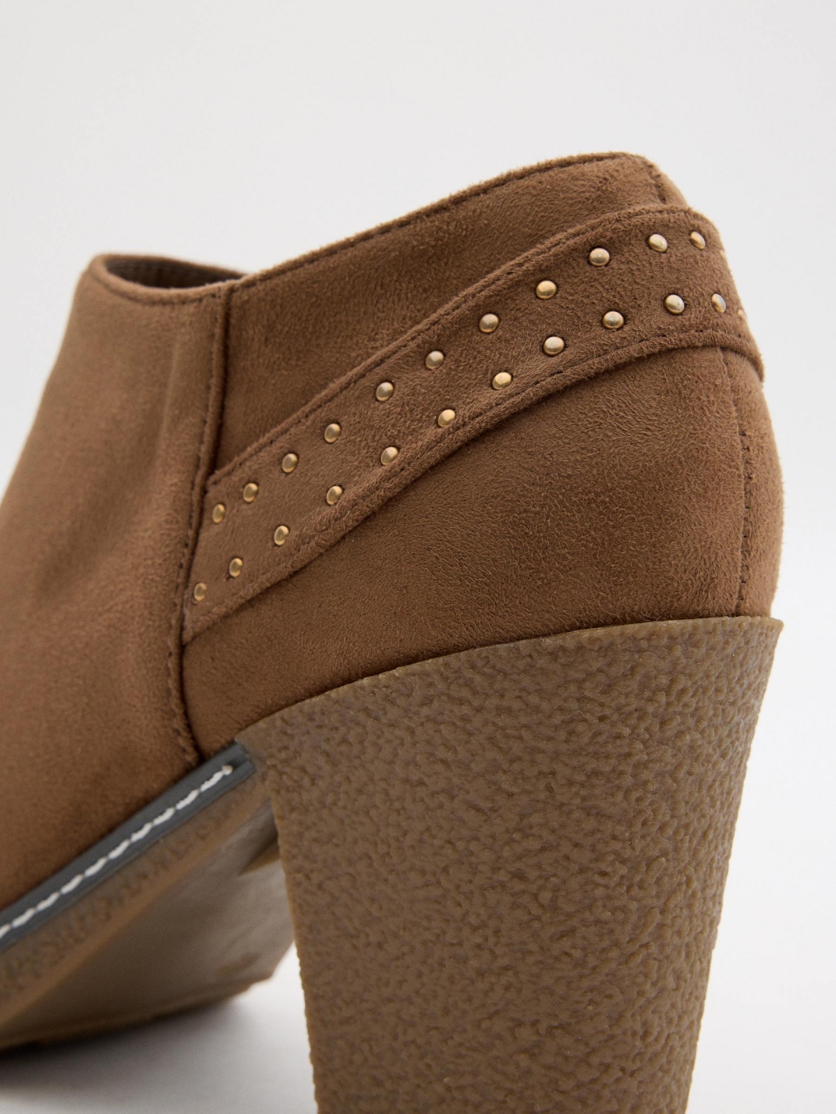 Camel heeled ankle boots with studs brown detail view