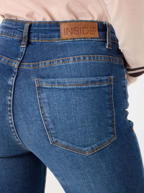 Blue medium waist skinny jeans indigo detail view