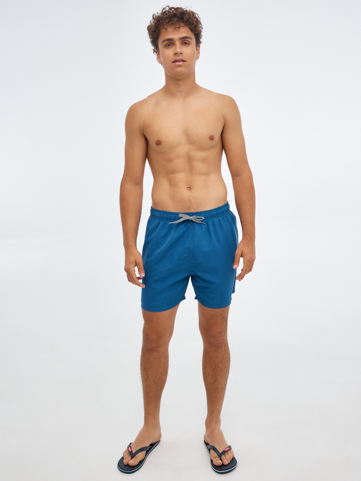 Basic swimsuit with pockets electric blue front view