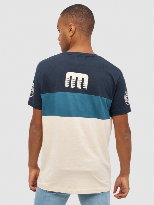 T-shirt text color block. sand middle back view