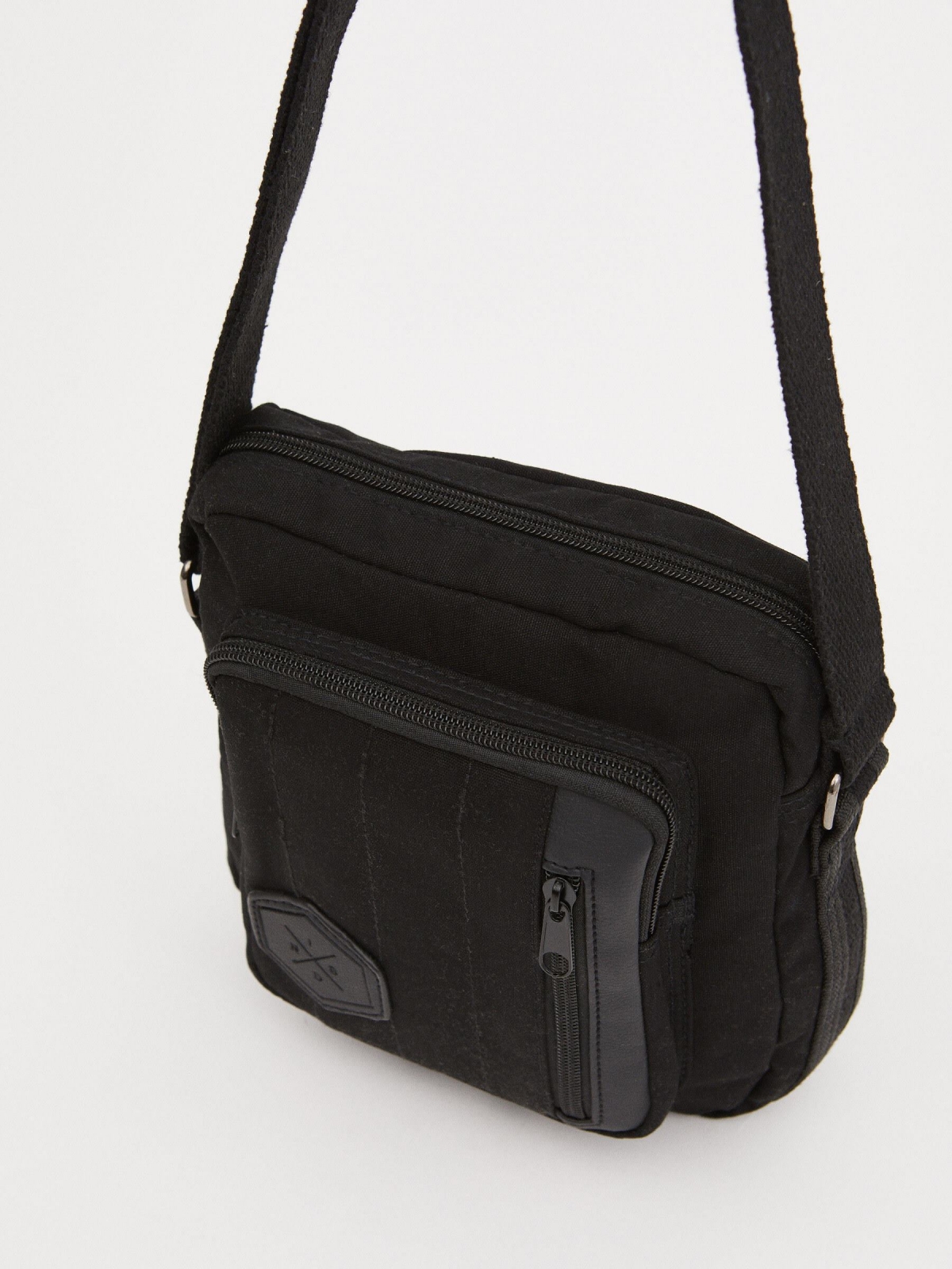 Shoulder bag exterior pocket black with a model