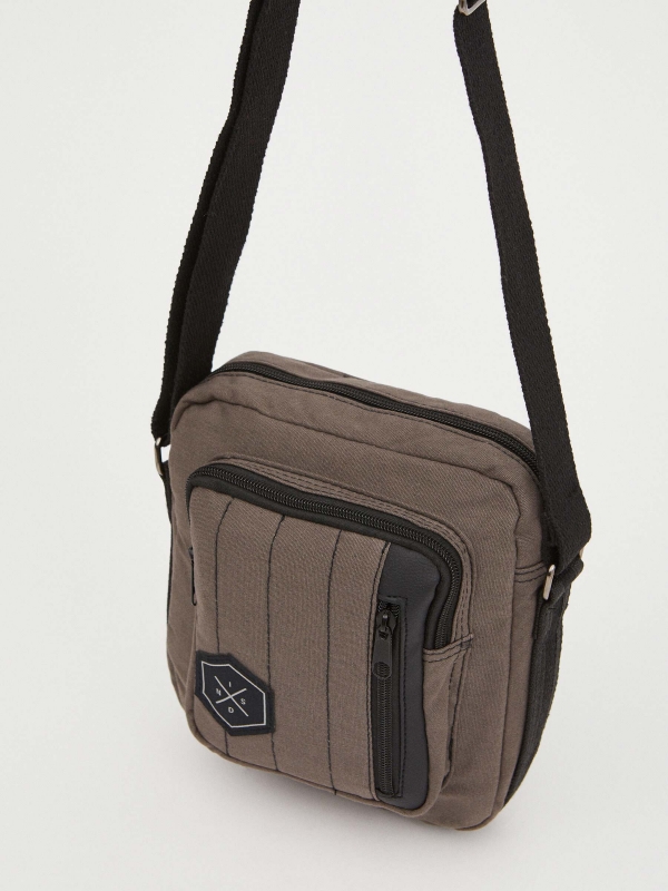 Shoulder bag exterior pocket brown with a model