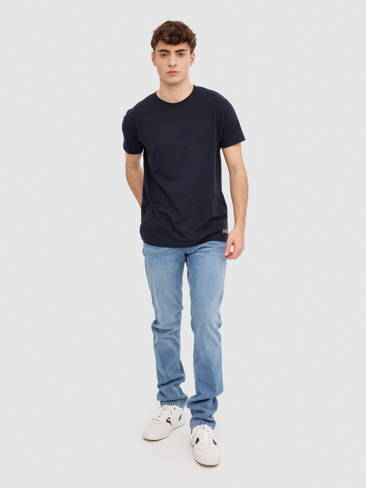 Jeans slim fit azul claro uniforme azul vista geral frontal