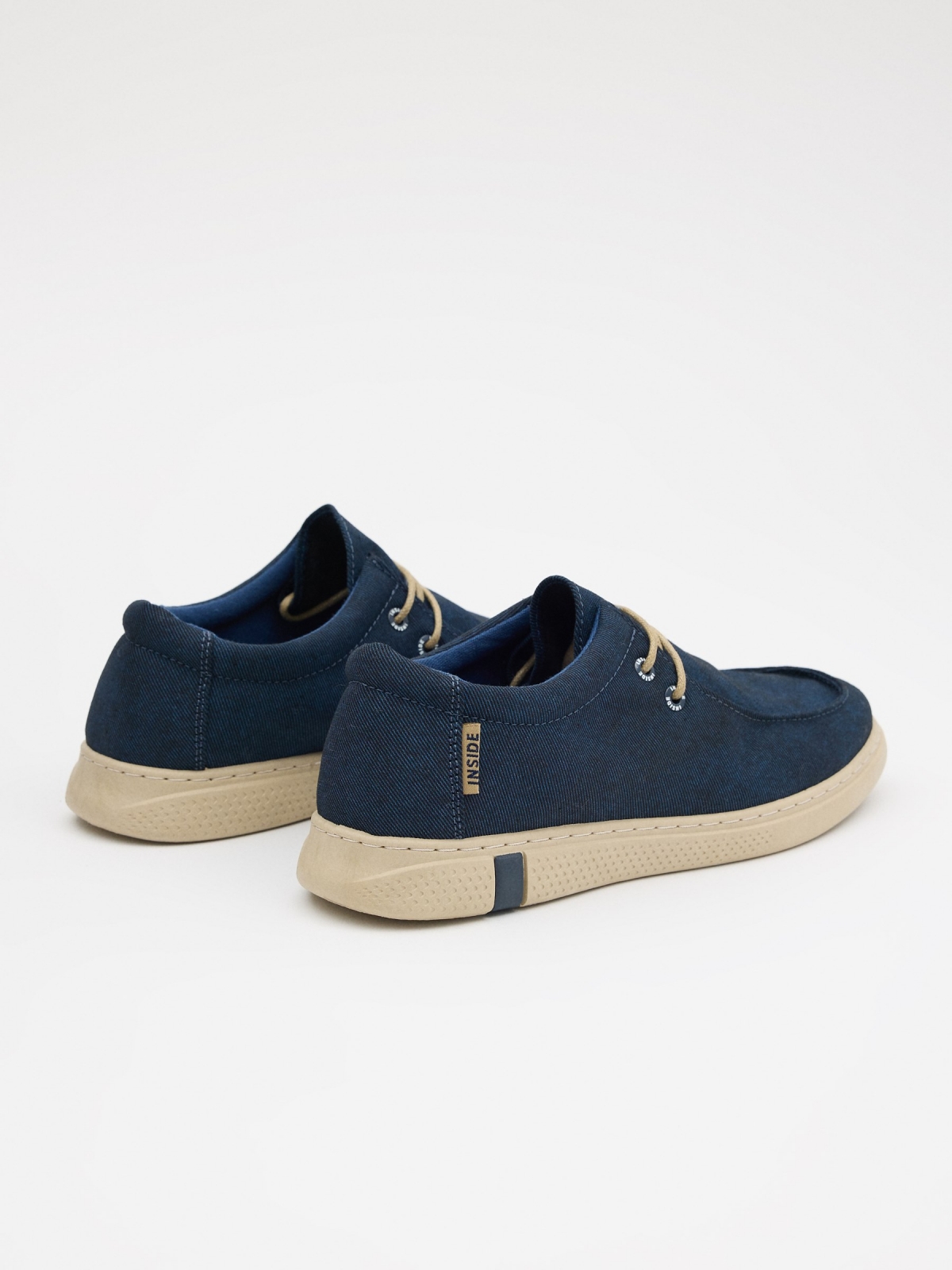 Casual navy canvas shoes petrol blue 45º back view