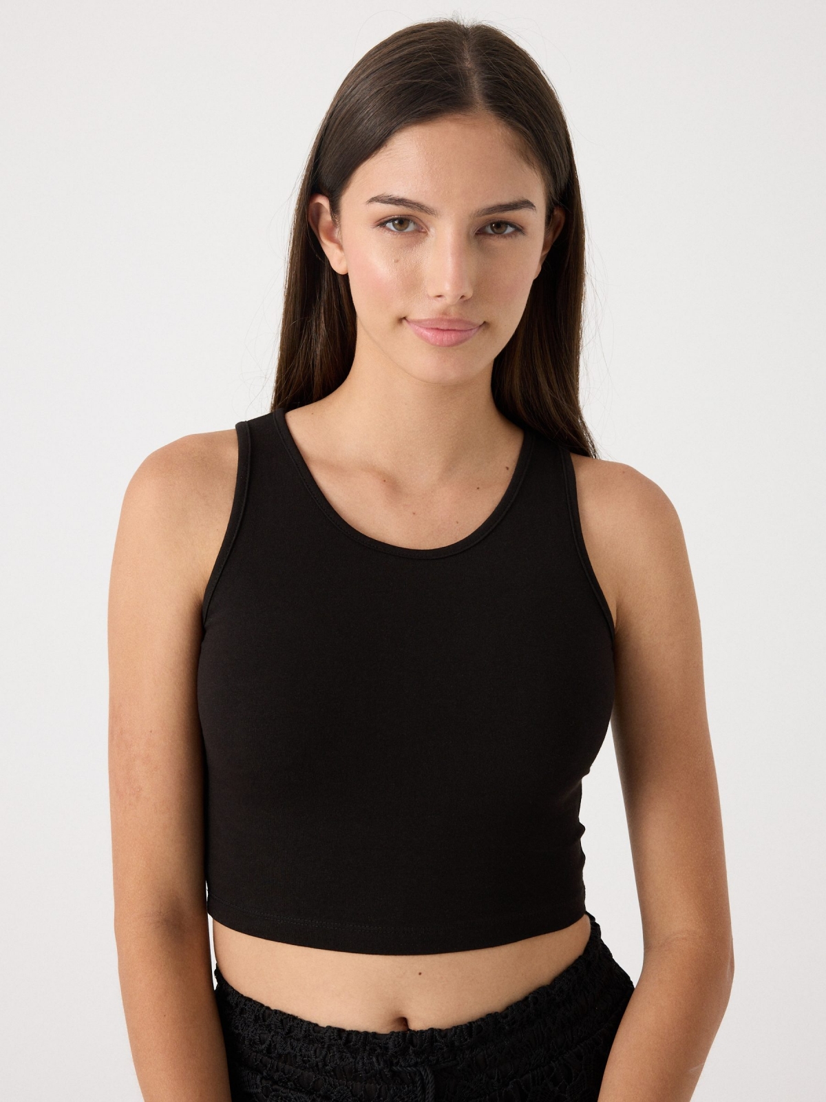 Basic sleeveless top black middle front view