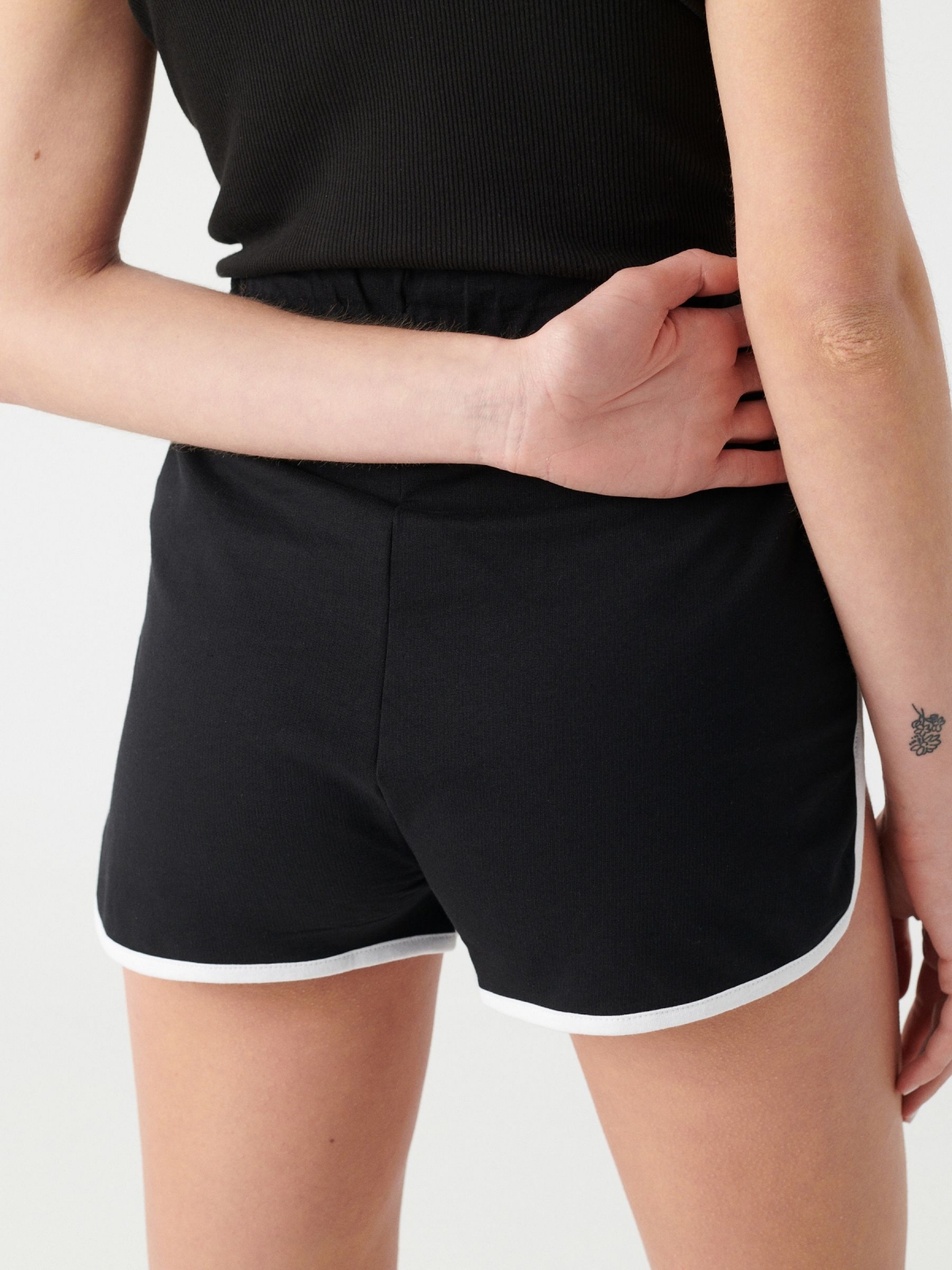 Contrast trim shorts black detail view