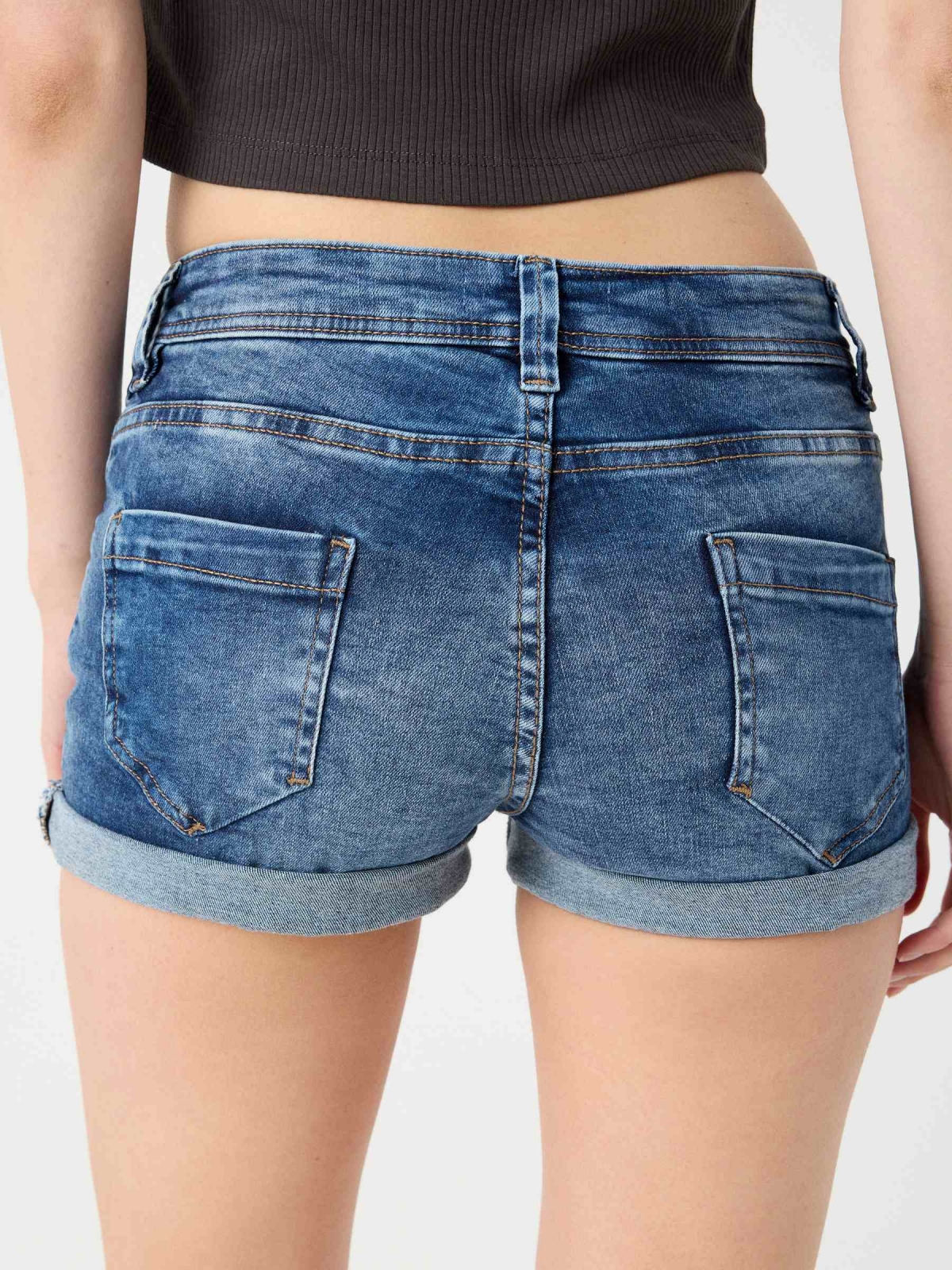 Ripped washed blue denim shorts blue detail view