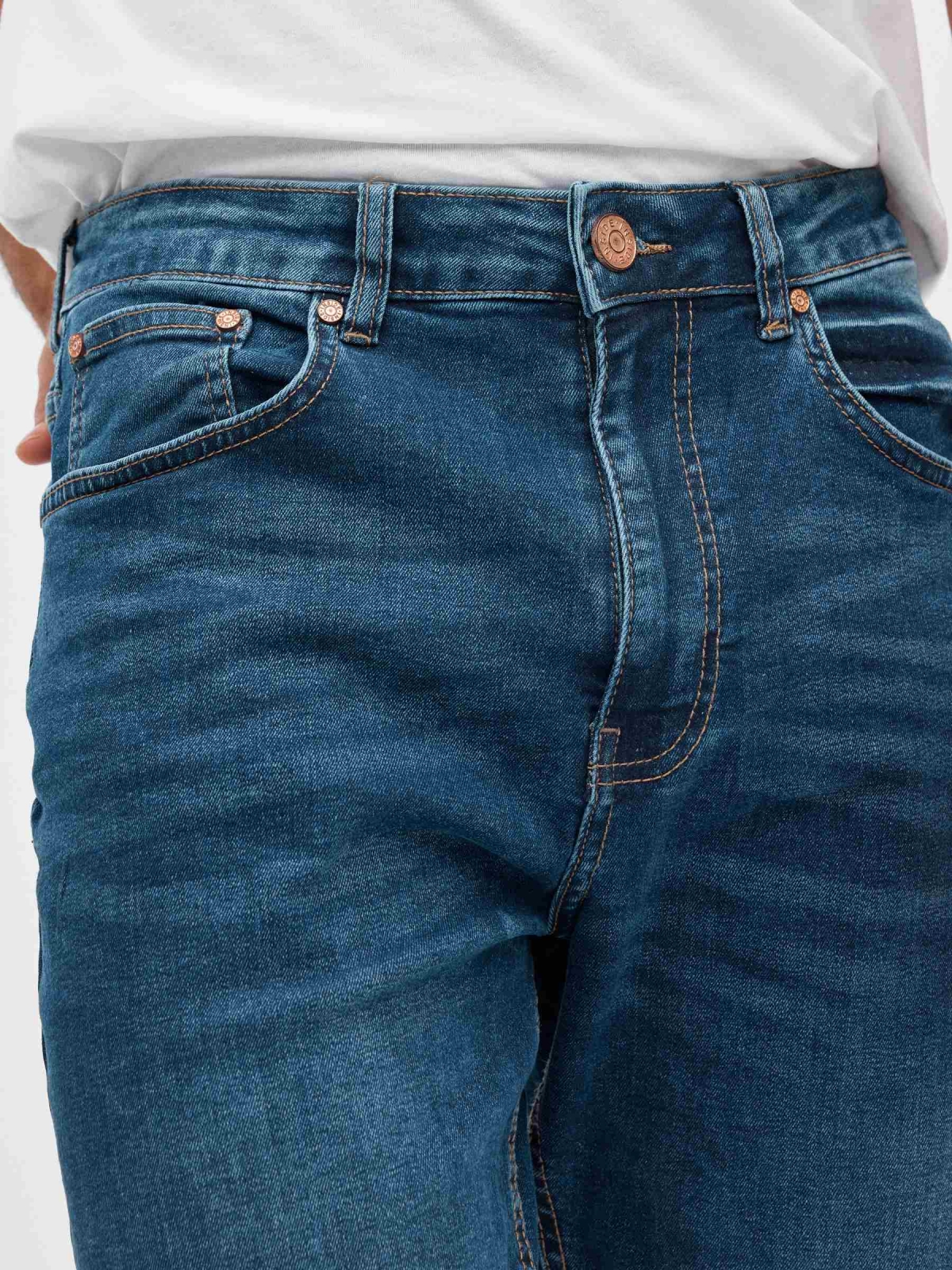 Frayed ripped denim bermuda shorts blue detail view