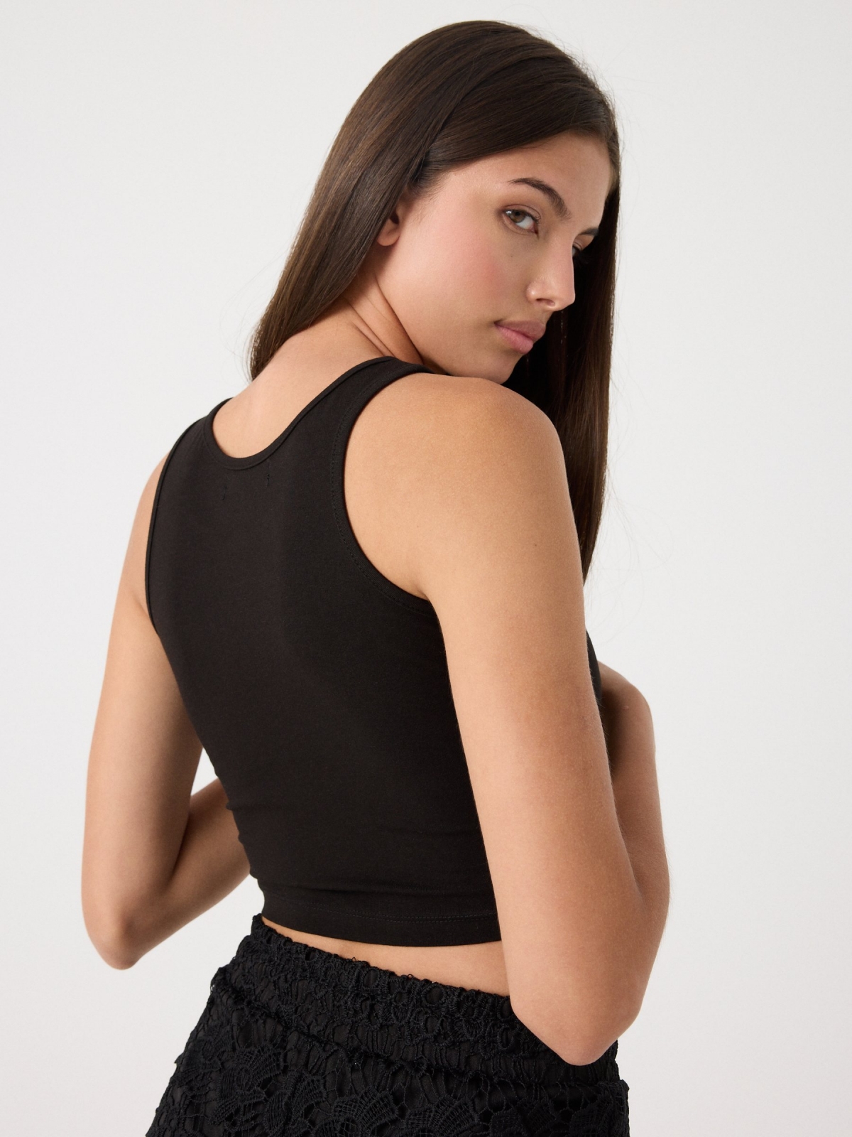 Basic sleeveless top black middle back view