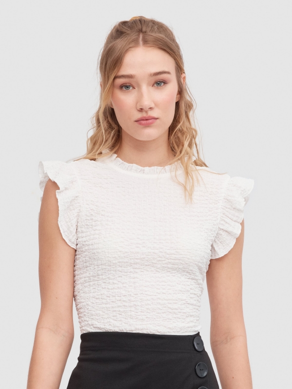 Ruffled top with cut out back white middle front view