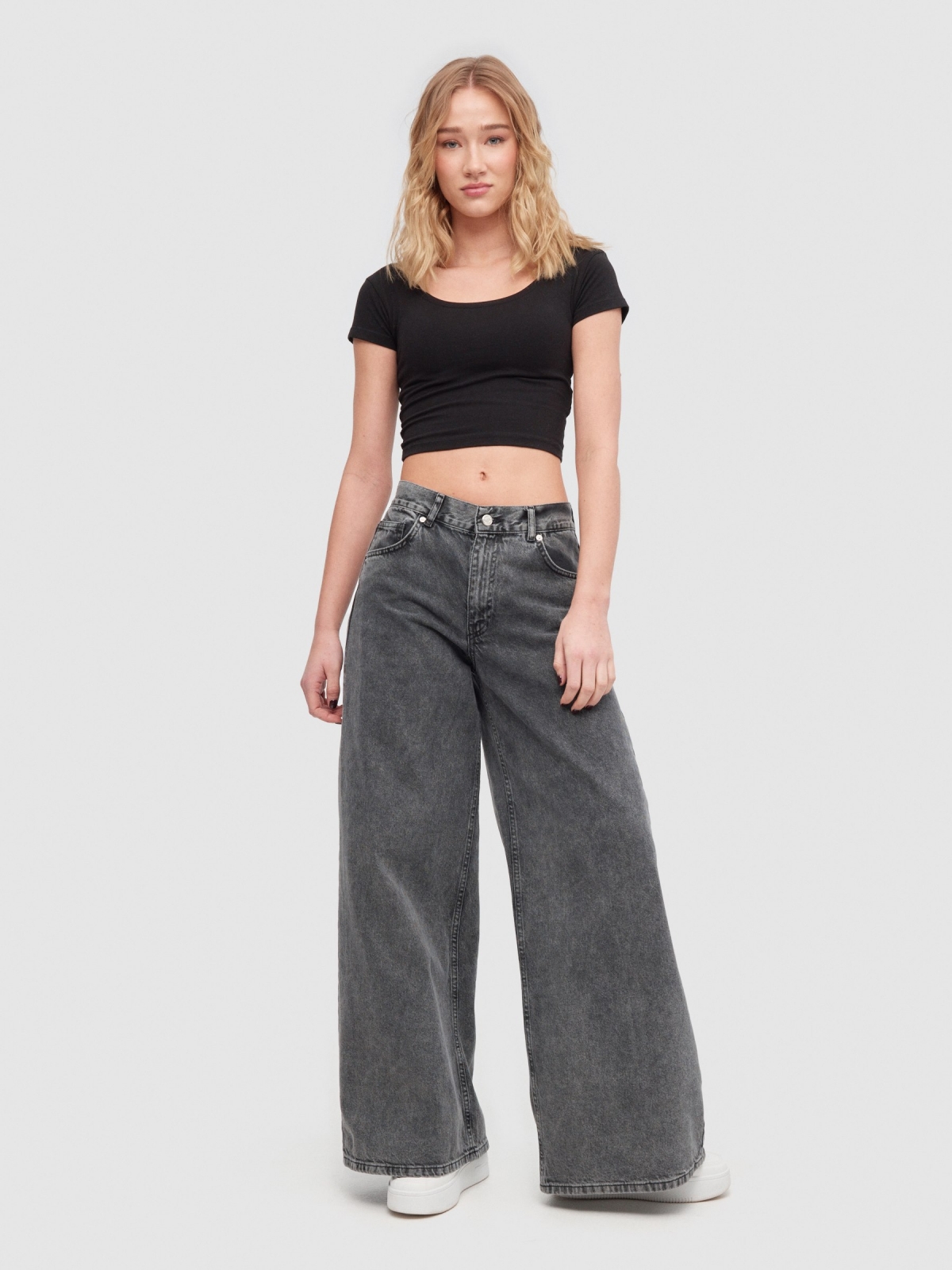 Wide leg grey jeans black front view
