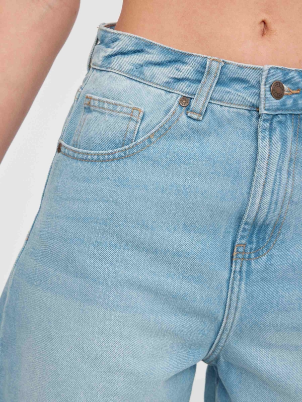High-waisted denim shorts light blue detail view