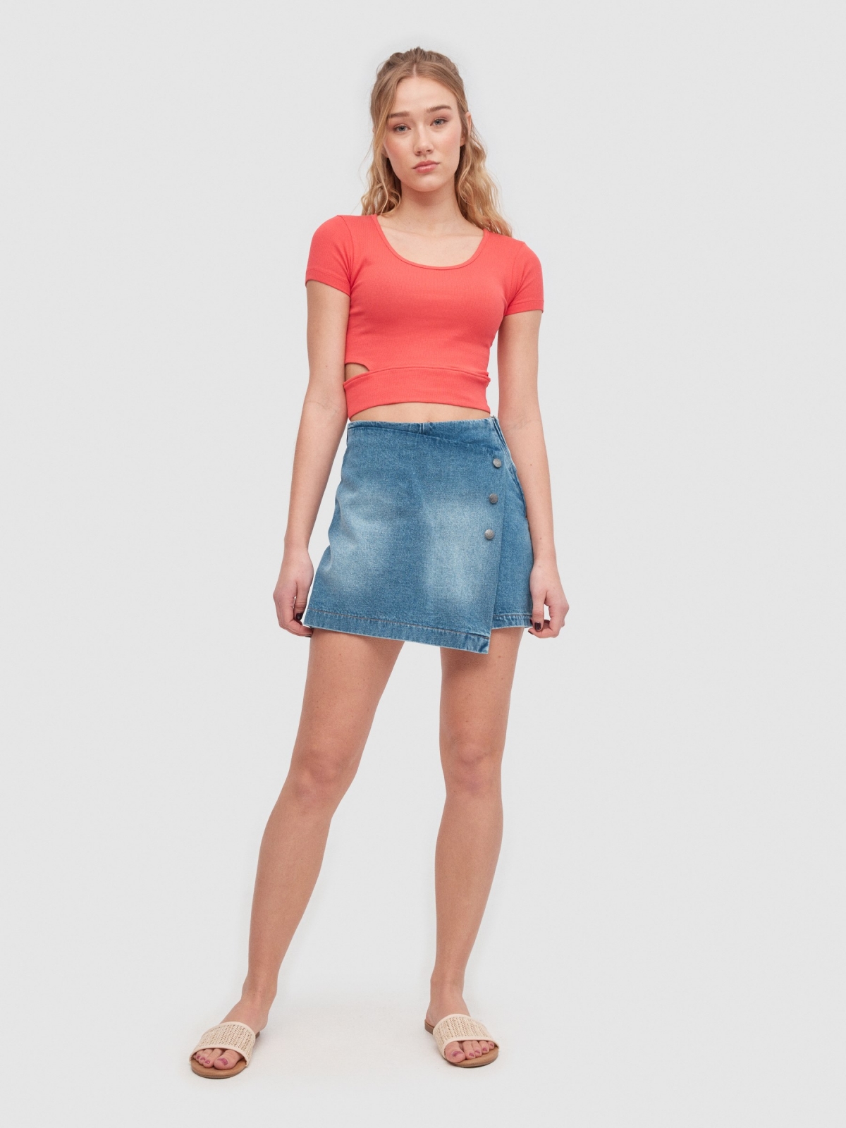 Denim button-down crossover skirt with buttons blue front view