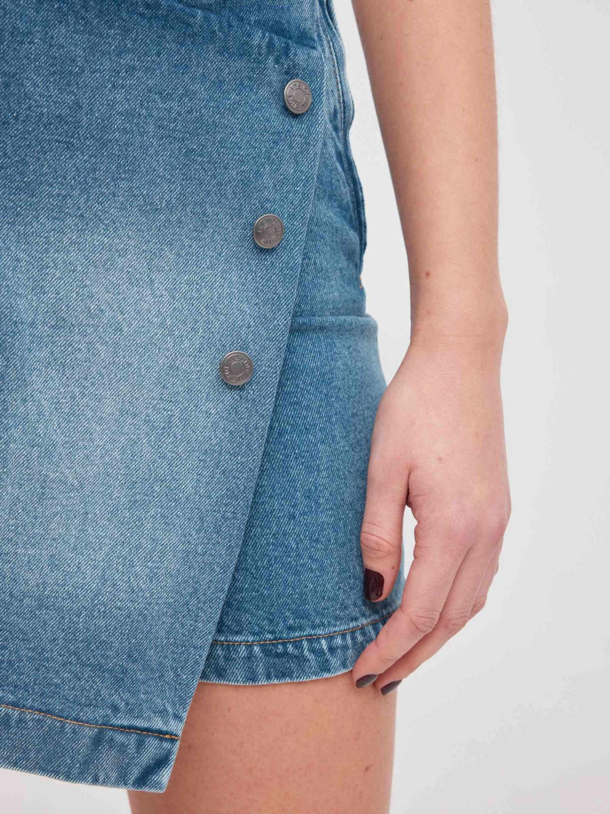 Denim button-down crossover skirt with buttons blue detail view
