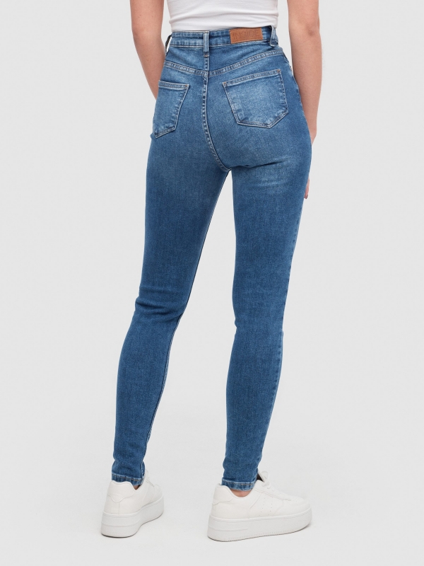 Jeans skinny cintura alta azul vista meia traseira