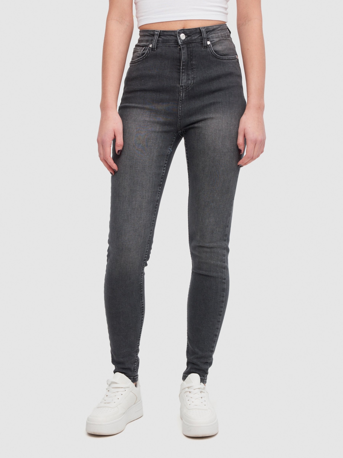 Jeans skinny de cintura alta desgaste preto vista meia frontal