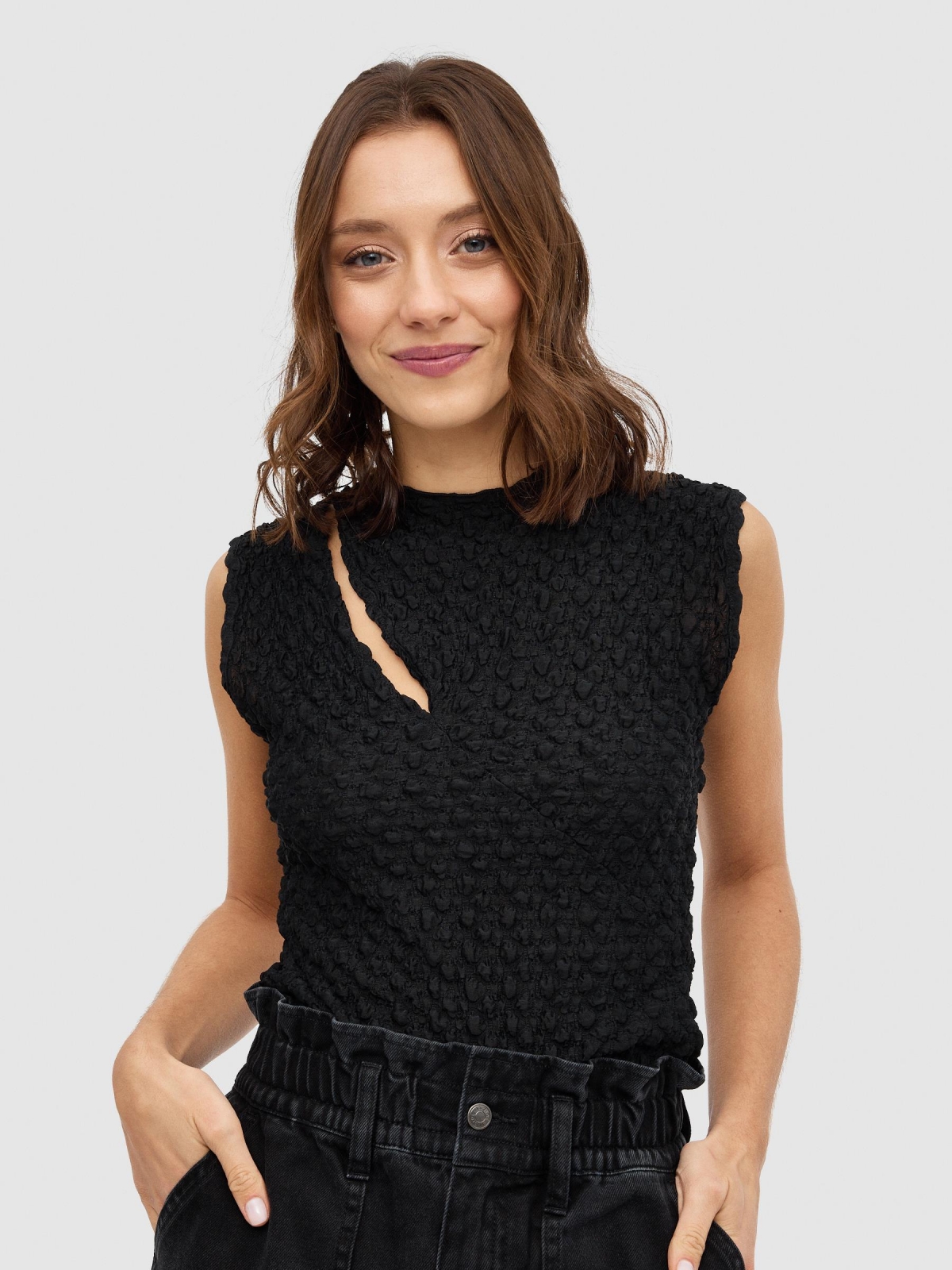 Top cut out ruffled black middle front view