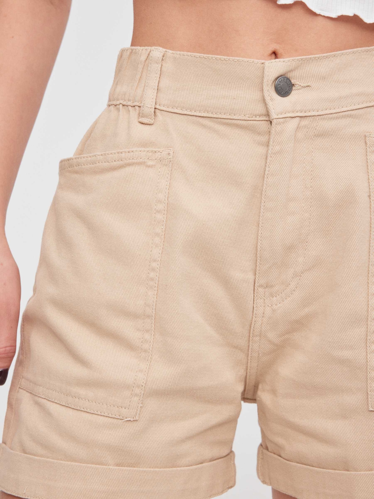 Baggy short sand detail view