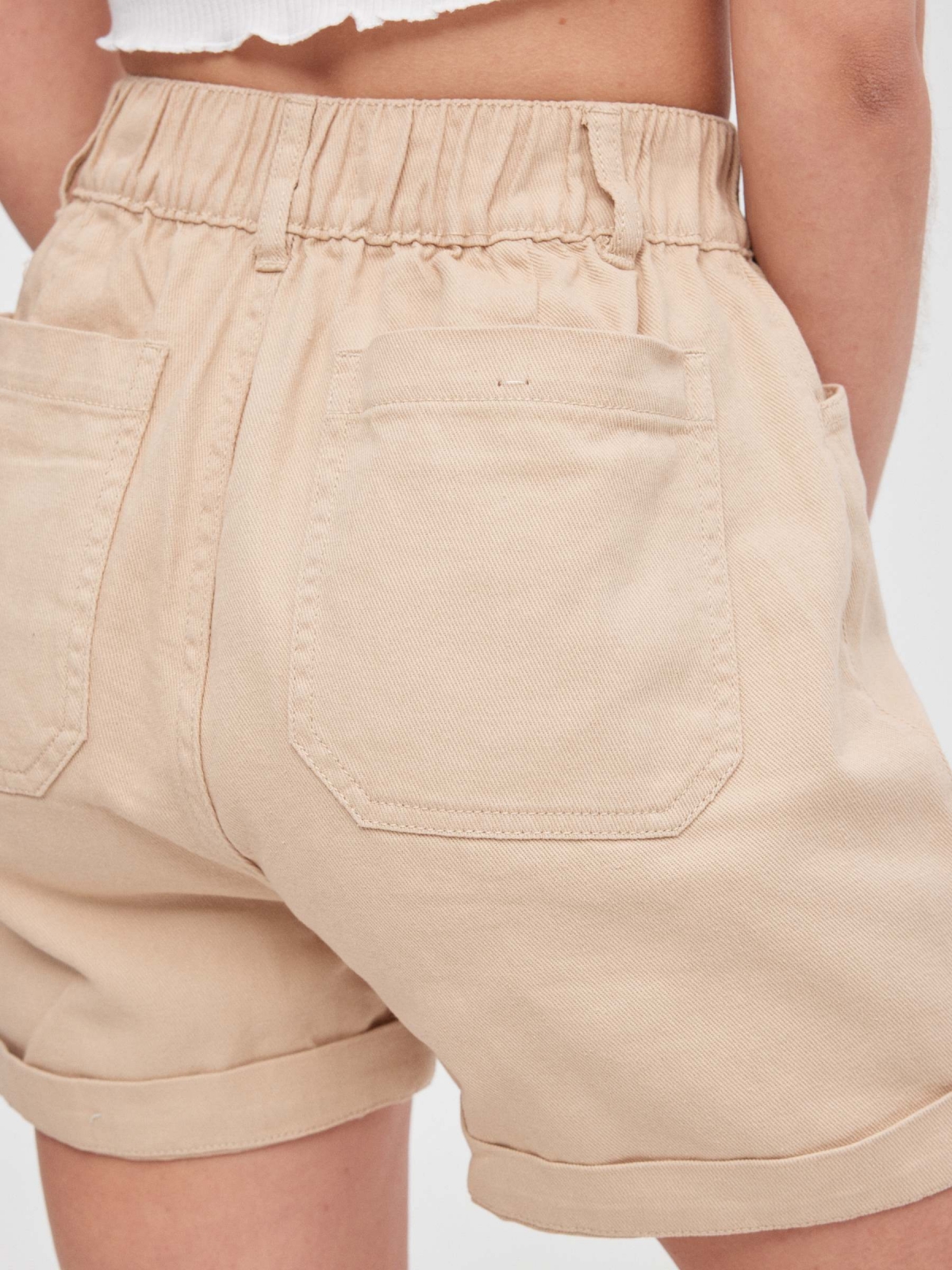Baggy short sand detail view